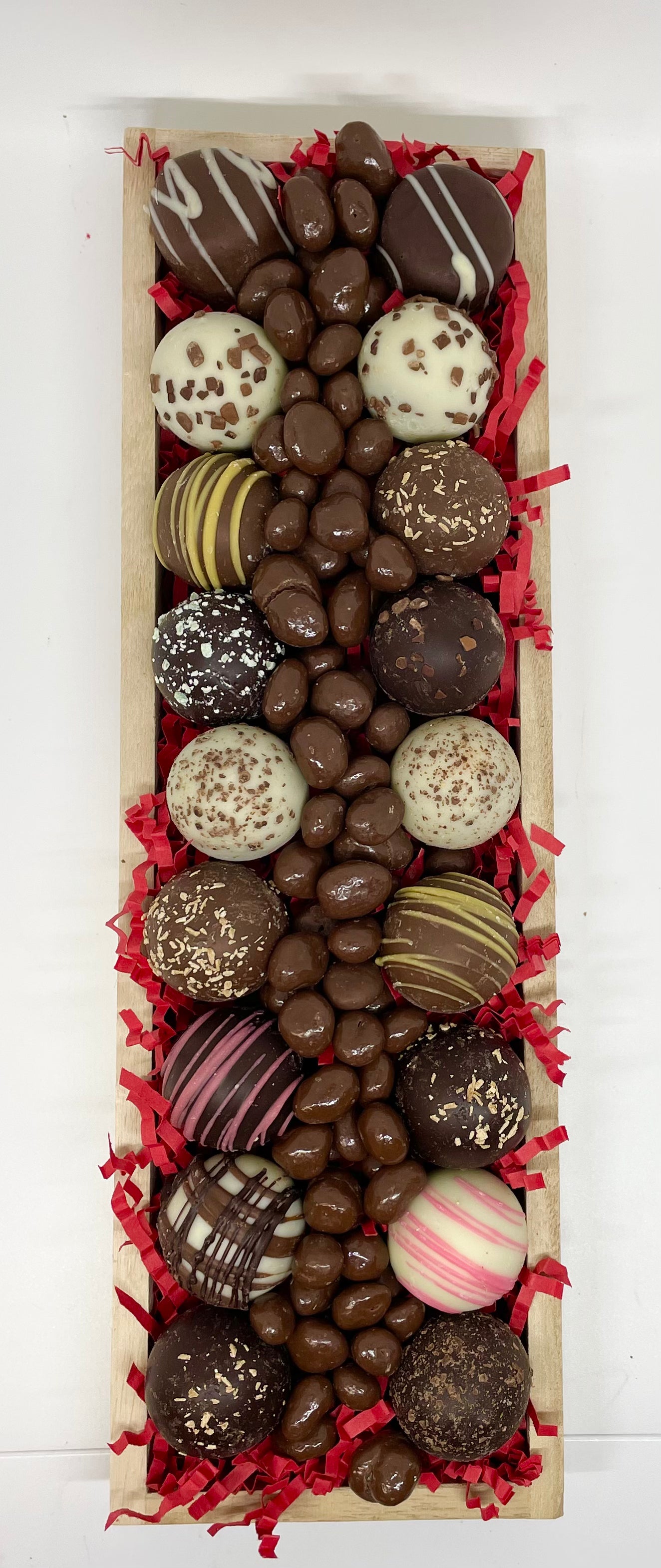Truffle TrayGourmet Chocolate TrayA nice gift presentation of handmade chocolate clusters and barks. Affordable as a gift for virtually any occasion. Ribbon color and chocolates vary per season.
Same
